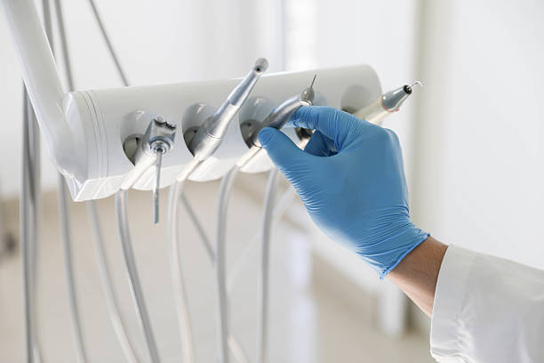 Professional Tooth Extraction technician working in Clearwater, KS